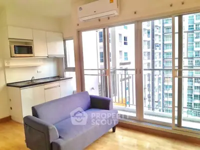 Modern living room with balcony view in high-rise apartment