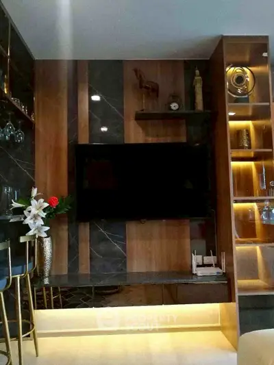 Modern living room with stylish TV wall unit and elegant decor