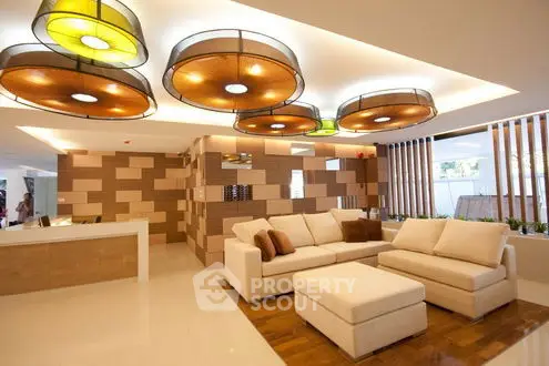 Luxurious modern living room with stylish lighting and elegant furniture