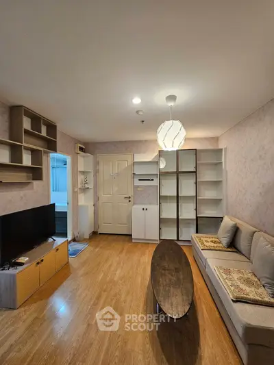 Cozy living room with modern furniture and wooden flooring