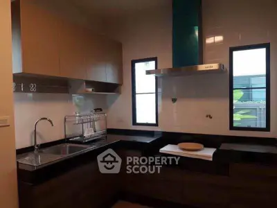 Modern kitchen with sleek cabinetry and stainless steel appliances