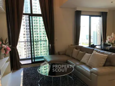 Luxurious living room with city view and elegant decor