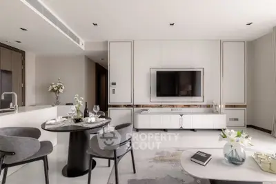 Luxurious modern living room with elegant decor and open kitchen layout, perfect for stylish urban living.