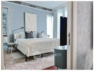 Luxurious modern bedroom with elegant decor and natural light