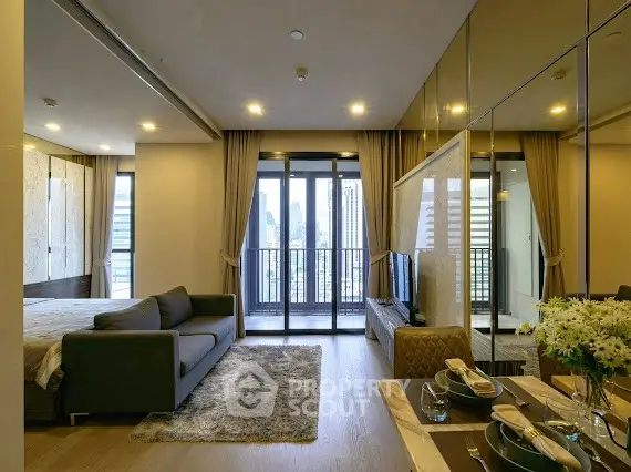 Luxurious open-plan living room with city view and elegant decor