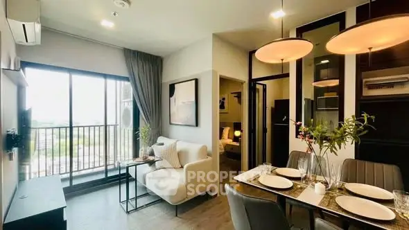 Modern living room with dining area and balcony view in stylish apartment.