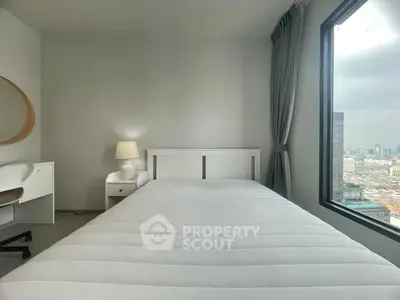 Modern bedroom with city view and minimalist decor