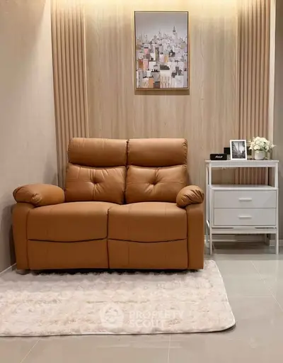 Cozy living room with plush leather sofa and elegant decor