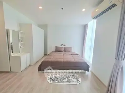 Modern bedroom with minimalist design and natural light