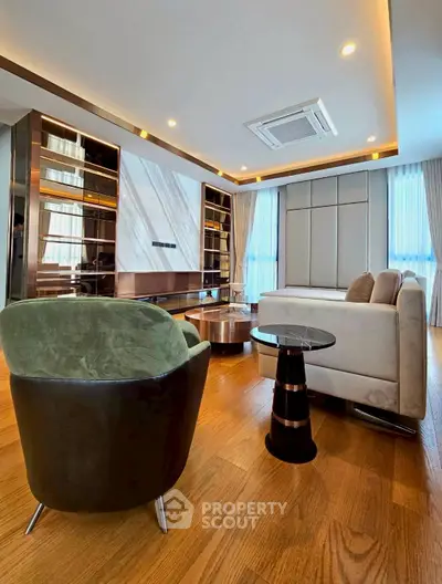 Luxurious modern living room with elegant furniture and wooden flooring