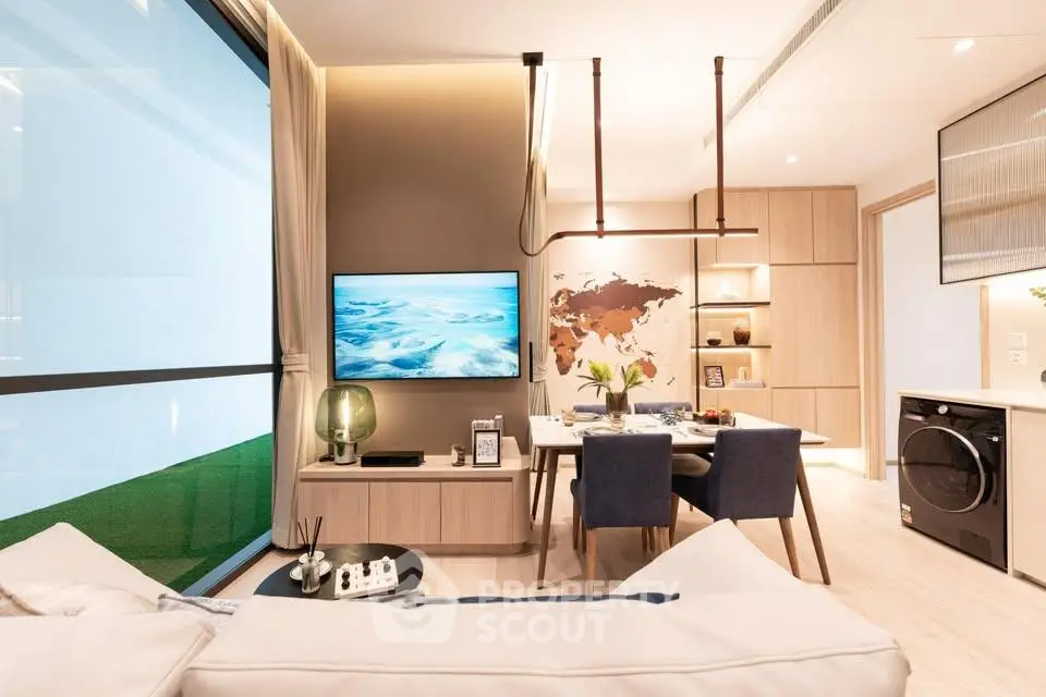Modern living room with stylish decor, large window, and integrated dining area featuring a world map wall art.