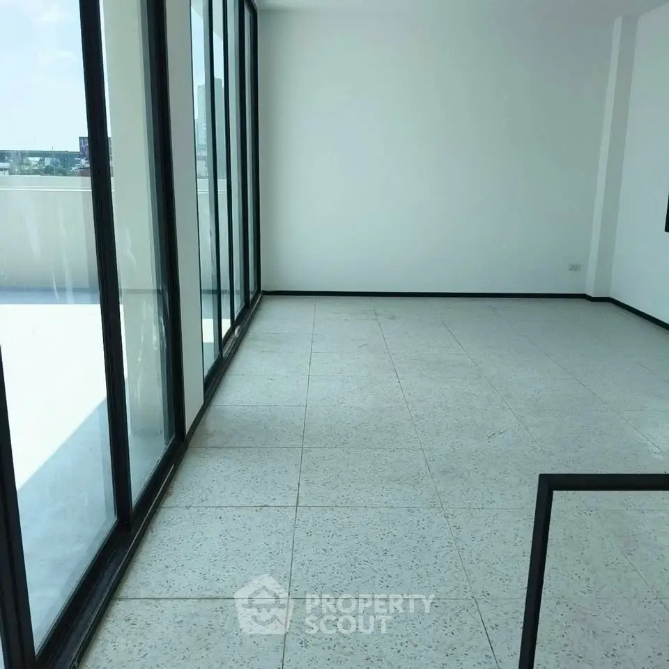 Spacious corner unit with large windows and abundant natural light