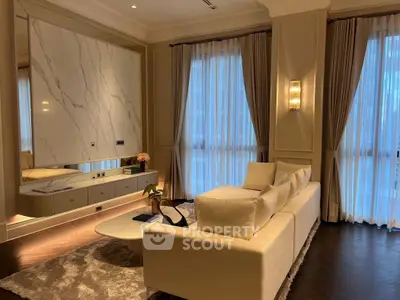 Luxurious living room with elegant decor and large windows