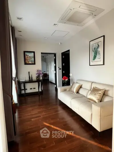 Elegant living room with hardwood floors and modern decor
