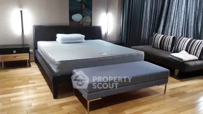 Luxurious bedroom with modern decor and elegant lighting