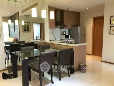 Modern kitchen and dining area with sleek design and contemporary furniture