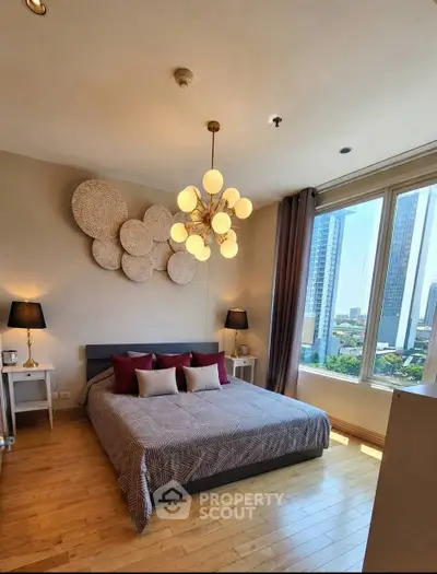Luxurious bedroom with modern decor and stunning city view from large windows.