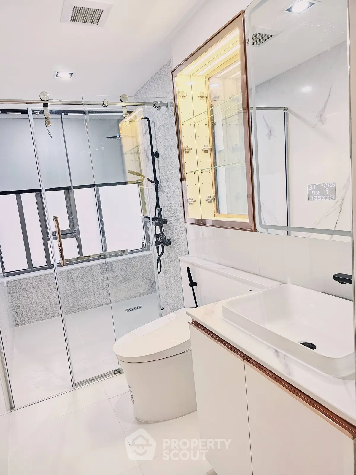 Modern bathroom with sleek fixtures and glass shower enclosure