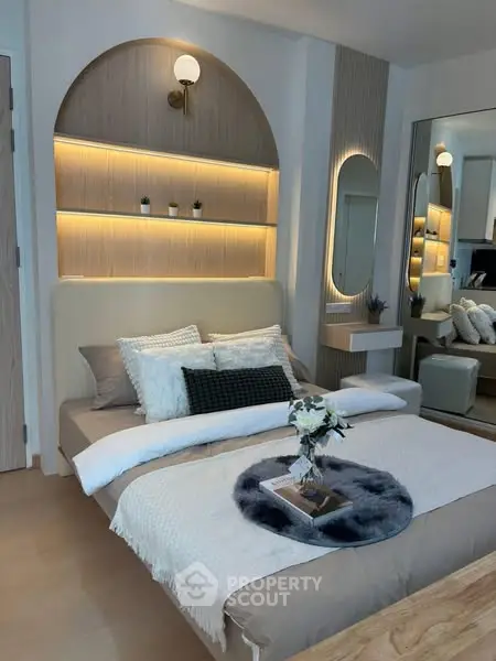Stylish modern bedroom with cozy lighting and elegant decor