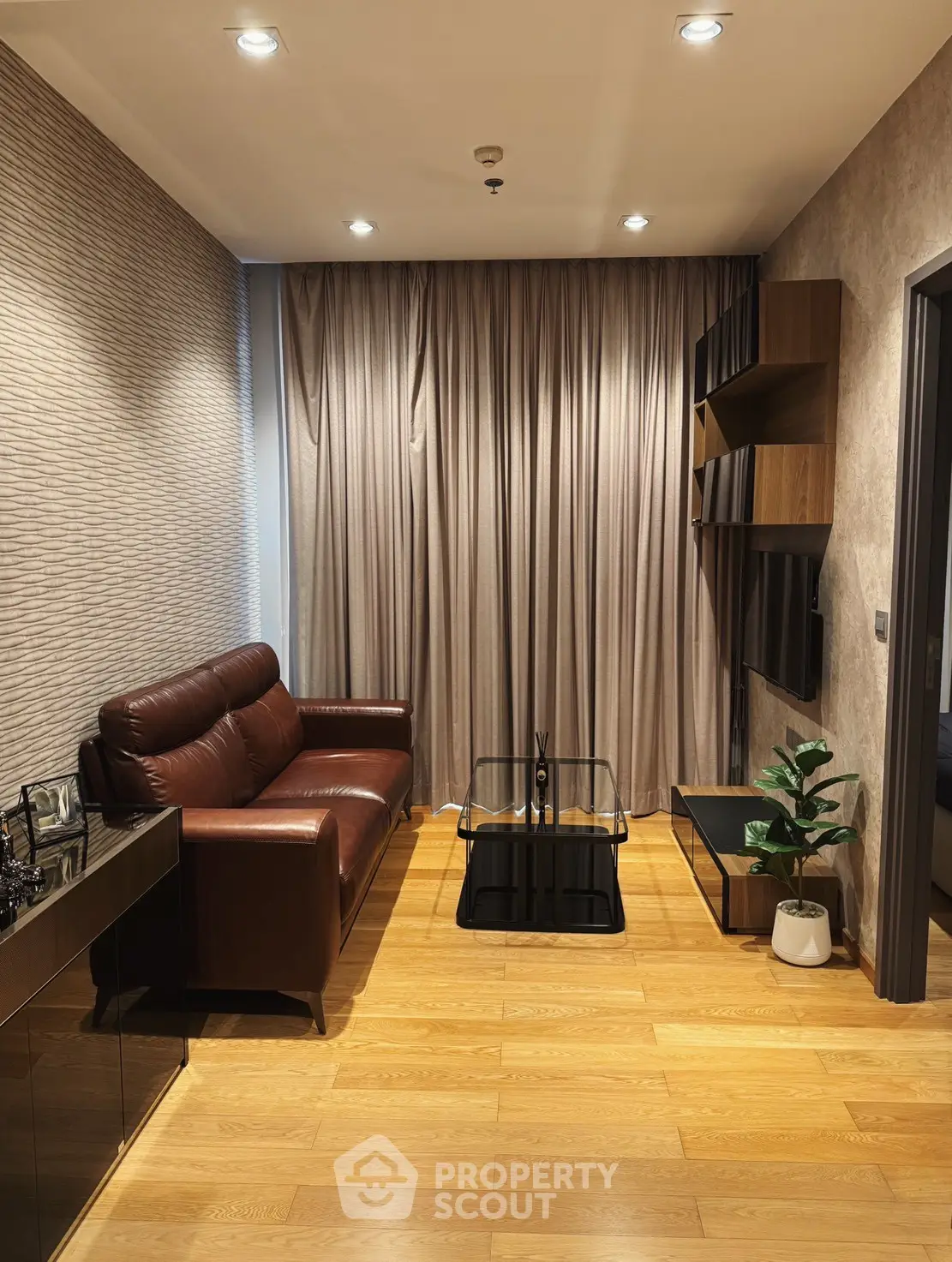Modern living room with leather sofa and elegant decor