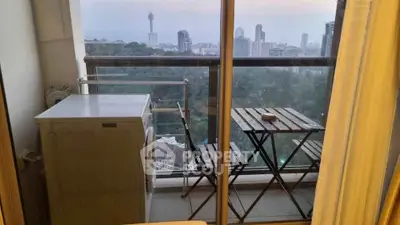 Charming balcony with washer and city view, perfect for urban living.