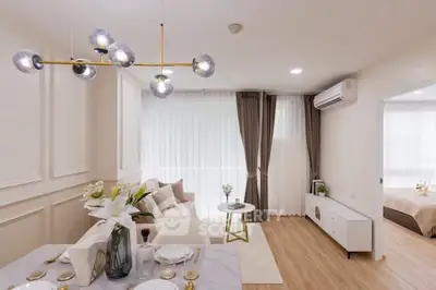 Elegant modern living room with stylish decor and natural light