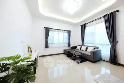 Spacious modern living room with elegant decor and natural light