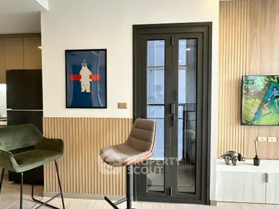 Modern apartment interior with stylish decor and balcony access