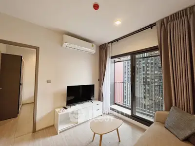 Modern living room with balcony view in urban apartment
