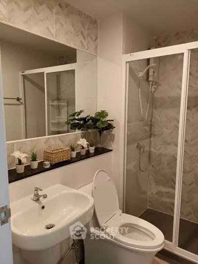 Modern bathroom with glass shower and stylish decor