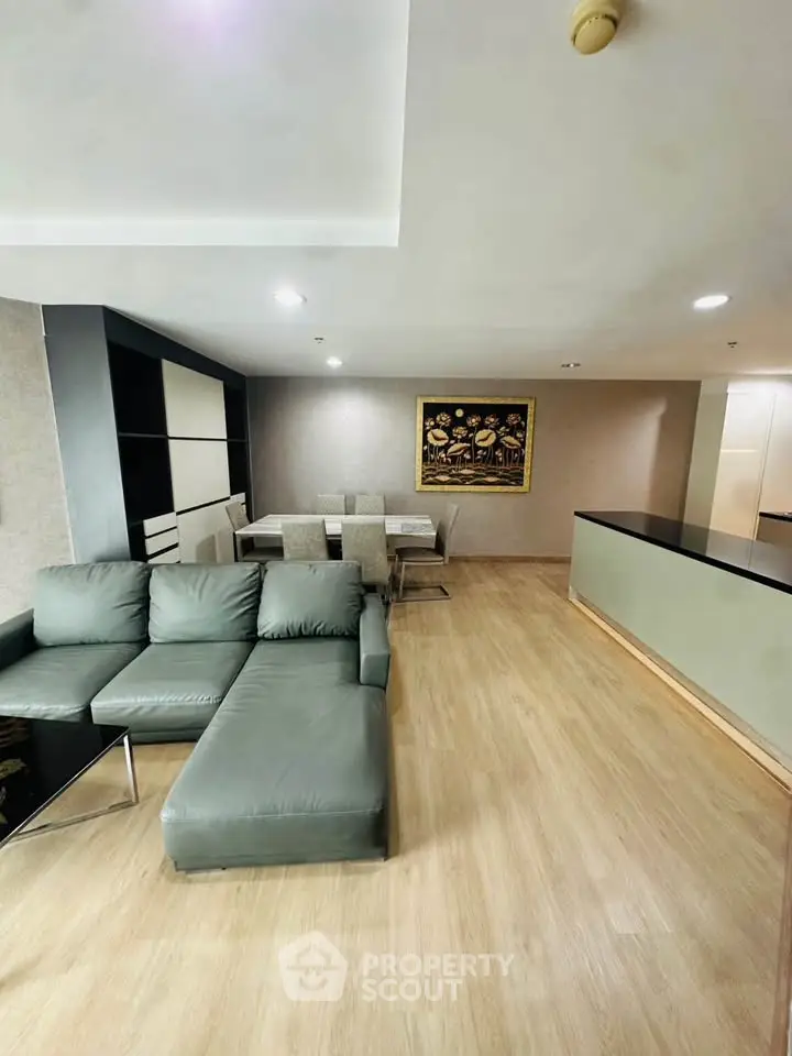 Spacious modern living room with elegant decor and open layout, perfect for entertaining guests.