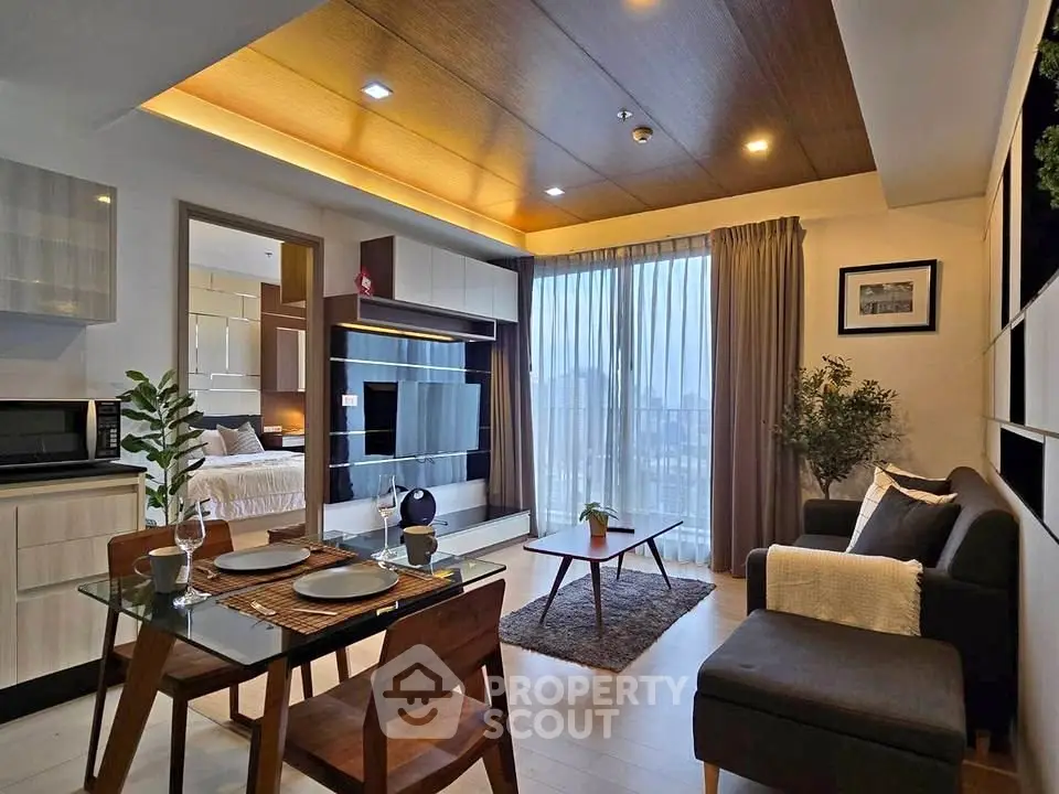 Modern open-plan living room with stylish decor and city view