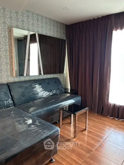 Stylish living room with modern furniture and elegant curtains