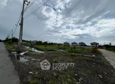 Scenic view of residential development with modern houses and cloudy sky