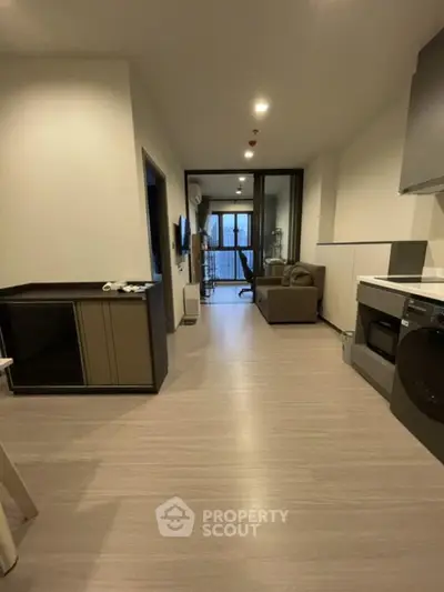 Modern apartment interior with open layout and sleek furnishings