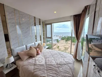 Luxurious bedroom with stunning ocean view and elegant decor