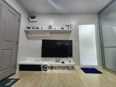 Modern living room with sleek TV setup and minimalist decor