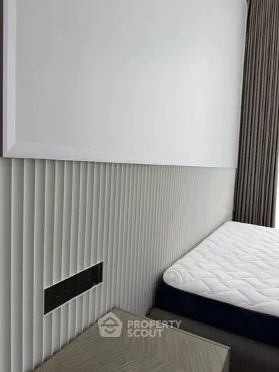 Modern bedroom with minimalist design and natural light