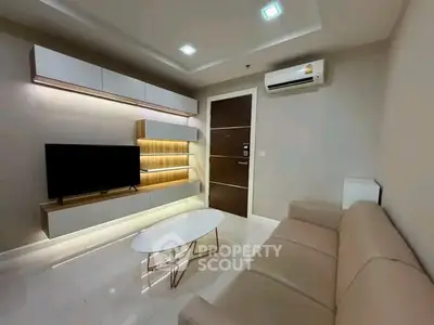 Modern living room with sleek furniture and ambient lighting