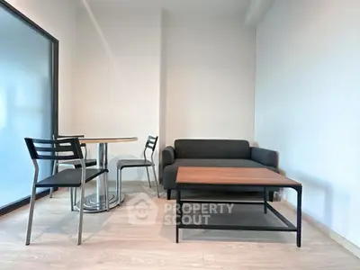 Modern living room with sleek furniture and natural light