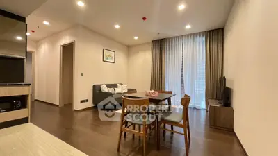 Spacious modern living room with elegant decor and ample natural light