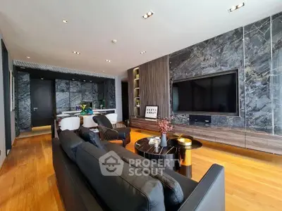 Luxurious modern living room with marble accents and sleek furnishings