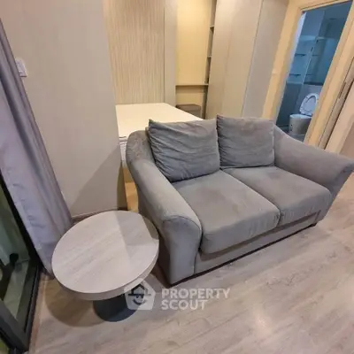 Cozy living room with plush sofa and modern decor in stylish apartment