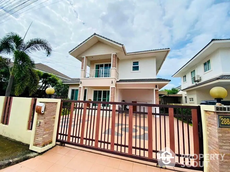 Stunning two-story house with modern design and spacious driveway in a serene neighborhood.