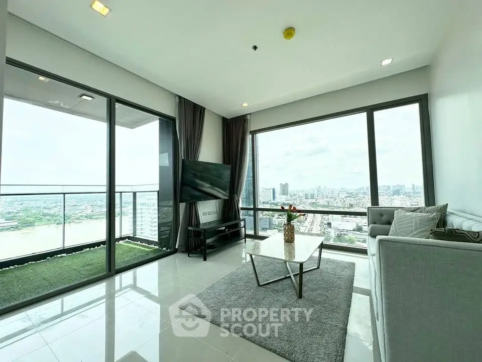 Spacious living room with stunning city view and modern decor