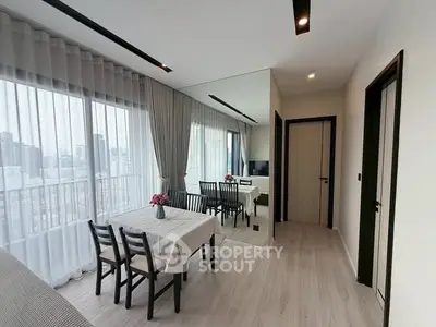 Modern apartment dining area with city view and elegant decor