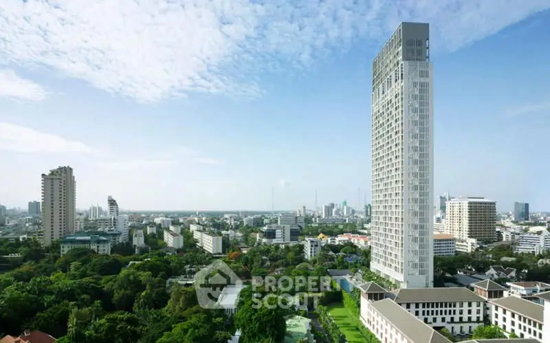 Stunning cityscape view with modern high-rise building and lush greenery, perfect for urban living.