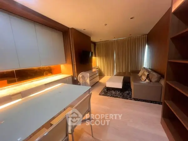 Modern living room with sleek furniture and ambient lighting