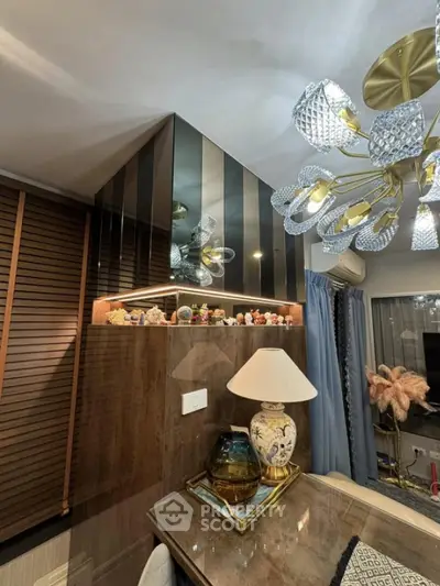 Luxurious living room with elegant chandelier and stylish decor