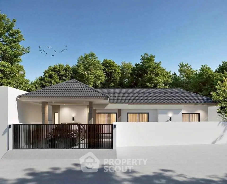 Modern single-story house with sleek design and lush greenery, perfect for serene living.